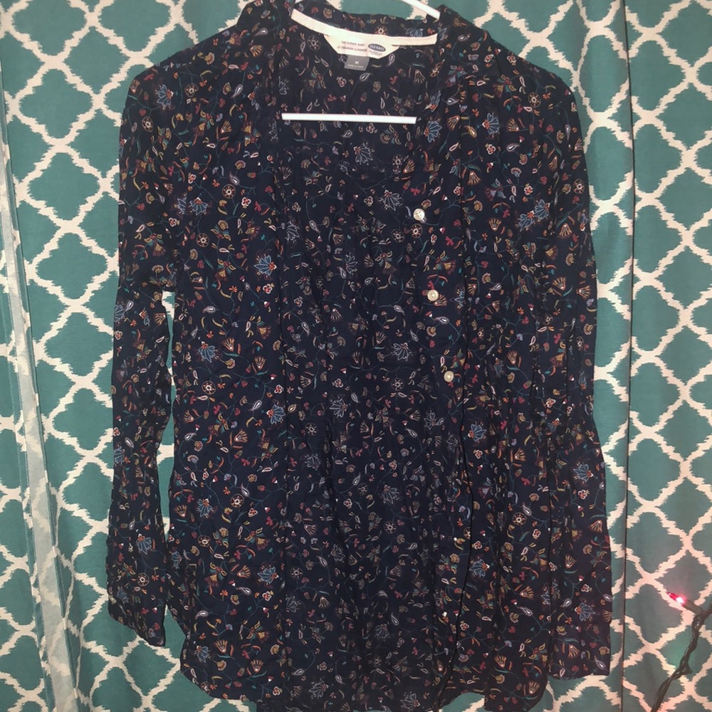 A dark and colorful long-sleeve shirt